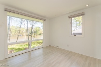 Fantastic contemporary3 Bedroom, 2.5 Bath lakefront colonial on Tanglewood National Golf Club in Ohio - for sale on GolfHomes.com, golf home, golf lot