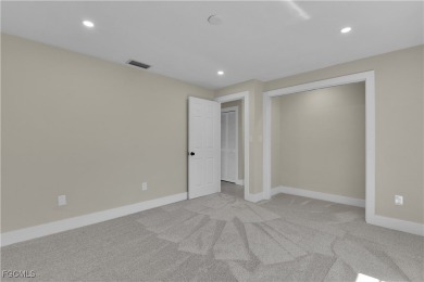 Boasting 3 bedrooms plus a den, 2.5 baths, and a 2-car garage on LaPlaya Golf Club in Florida - for sale on GolfHomes.com, golf home, golf lot