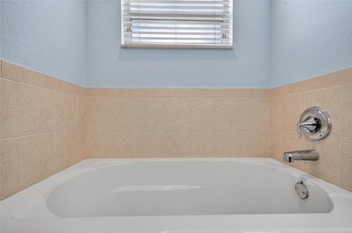 A rare find! This spacious 4-bedroom, 2.5-bath home with a 2-car on Stoneybrook Golf Club At Heritage Harbour in Florida - for sale on GolfHomes.com, golf home, golf lot