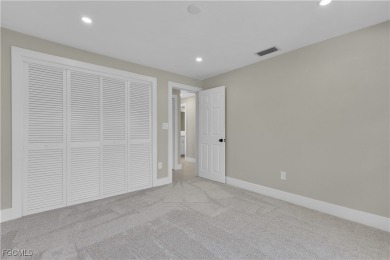 Boasting 3 bedrooms plus a den, 2.5 baths, and a 2-car garage on LaPlaya Golf Club in Florida - for sale on GolfHomes.com, golf home, golf lot