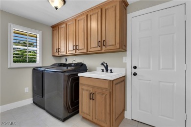 Boasting 3 bedrooms plus a den, 2.5 baths, and a 2-car garage on LaPlaya Golf Club in Florida - for sale on GolfHomes.com, golf home, golf lot