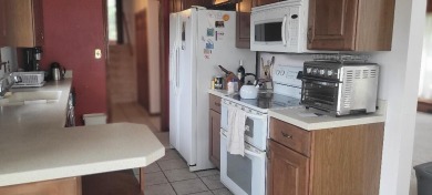 What a find. Corner parcel just down from a championship golf on The Oaks At Kincheloe in Michigan - for sale on GolfHomes.com, golf home, golf lot
