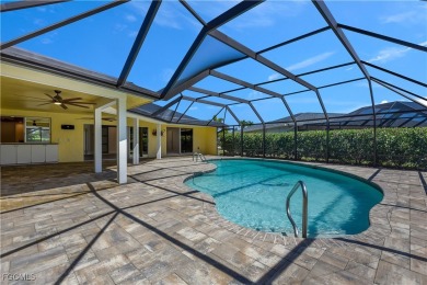 Boasting 3 bedrooms plus a den, 2.5 baths, and a 2-car garage on LaPlaya Golf Club in Florida - for sale on GolfHomes.com, golf home, golf lot