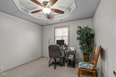 CHARMING LOG CABIN STYLE BUILD-OVER SITS PRETTY ON TRIPLE LOT!!! on River Golf and Country Club at Lake Royale in North Carolina - for sale on GolfHomes.com, golf home, golf lot