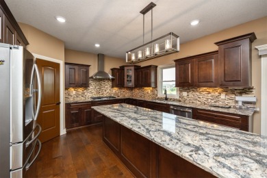 Beautiful Kimberley resale on Otter Creek Golf Course, this 1.5 on Otter Creek Golf Course in Iowa - for sale on GolfHomes.com, golf home, golf lot