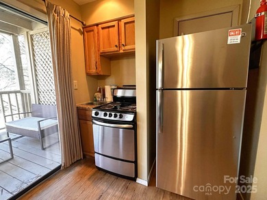 160 Whitney Blvd #7 in the Apple Valley Villas at Rumbling Bald on Rumbling Bald Resort on Lake Lure in North Carolina - for sale on GolfHomes.com, golf home, golf lot