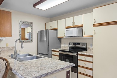 Discover comfortable, easy living in this charming 2-bedroom on Waikoloa Village Golf Club in Hawaii - for sale on GolfHomes.com, golf home, golf lot