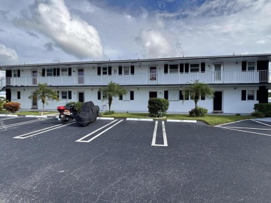 Enjoy expansive, picturesque water views from this completely on Leisureville Community Golf Course in Florida - for sale on GolfHomes.com, golf home, golf lot