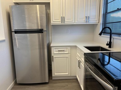 Enjoy expansive, picturesque water views from this completely on Leisureville Community Golf Course in Florida - for sale on GolfHomes.com, golf home, golf lot