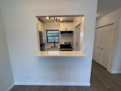 Enjoy expansive, picturesque water views from this completely on Leisureville Community Golf Course in Florida - for sale on GolfHomes.com, golf home, golf lot