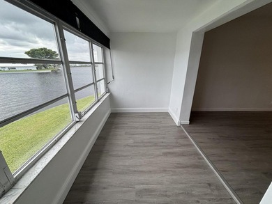 Enjoy expansive, picturesque water views from this completely on Leisureville Community Golf Course in Florida - for sale on GolfHomes.com, golf home, golf lot