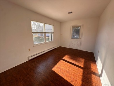 Corner two-bedroom, Greenbriar model with the perfect location! on Leisure Village Golf Course in New York - for sale on GolfHomes.com, golf home, golf lot