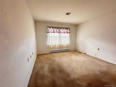 Corner two-bedroom, Greenbriar model with the perfect location! on Leisure Village Golf Course in New York - for sale on GolfHomes.com, golf home, golf lot