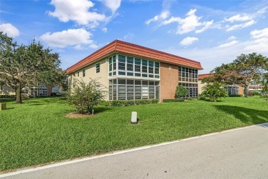 Price Improvement!!  Fantastic remodel with impact glass on The American Golf Club in Florida - for sale on GolfHomes.com, golf home, golf lot