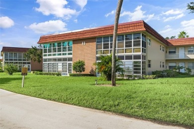 Price Improvement!!  Fantastic remodel with impact glass on The American Golf Club in Florida - for sale on GolfHomes.com, golf home, golf lot