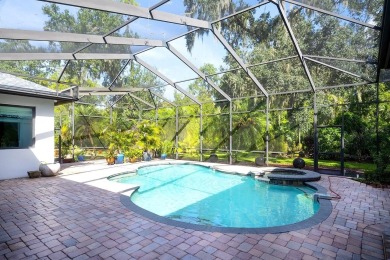 Stunning home-- you walk in and you are immediately impressed by on River Wilderness Golf and Country Club in Florida - for sale on GolfHomes.com, golf home, golf lot