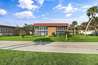 Price Improvement!!  Fantastic remodel with impact glass on The American Golf Club in Florida - for sale on GolfHomes.com, golf home, golf lot