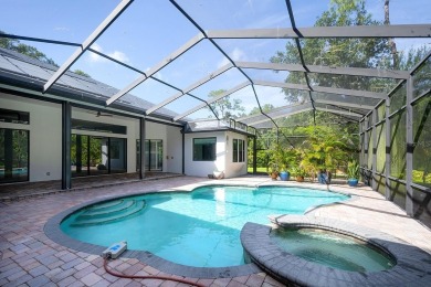 Stunning home-- you walk in and you are immediately impressed by on River Wilderness Golf and Country Club in Florida - for sale on GolfHomes.com, golf home, golf lot