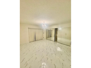 Great and spacious townhouse in one of the most desirable gated on Fountains Golf and Country Club in Florida - for sale on GolfHomes.com, golf home, golf lot