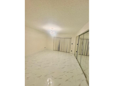 Great and spacious townhouse in one of the most desirable gated on Fountains Golf and Country Club in Florida - for sale on GolfHomes.com, golf home, golf lot