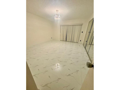 Great and spacious townhouse in one of the most desirable gated on Fountains Golf and Country Club in Florida - for sale on GolfHomes.com, golf home, golf lot