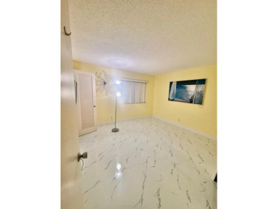 Great and spacious townhouse in one of the most desirable gated on Fountains Golf and Country Club in Florida - for sale on GolfHomes.com, golf home, golf lot
