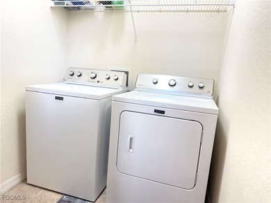 THIS LOVELY HOME IS A MUST SEE TO BELIEVE! This Lovely Home has on Gateway Golf and Country Club in Florida - for sale on GolfHomes.com, golf home, golf lot