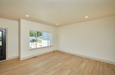 Welcome to this beautifully designed new construction home on Osceola Country Club in Iowa - for sale on GolfHomes.com, golf home, golf lot