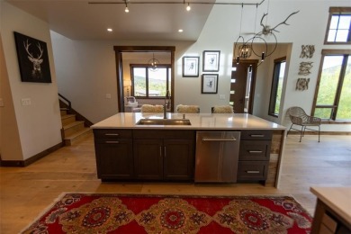 Tucked into the aspens and pines at the base of the Gore Range on Raven Golf Club At Three Peaks in Colorado - for sale on GolfHomes.com, golf home, golf lot