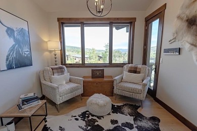 Tucked into the aspens and pines at the base of the Gore Range on Raven Golf Club At Three Peaks in Colorado - for sale on GolfHomes.com, golf home, golf lot