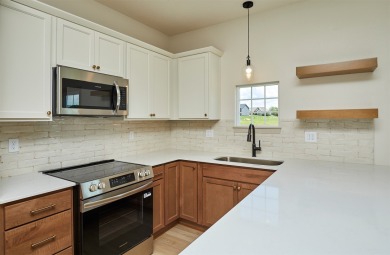 Welcome to this beautifully designed new construction home on Osceola Country Club in Iowa - for sale on GolfHomes.com, golf home, golf lot