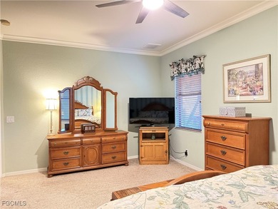 THIS LOVELY HOME IS A MUST SEE TO BELIEVE! This Lovely Home has on Gateway Golf and Country Club in Florida - for sale on GolfHomes.com, golf home, golf lot