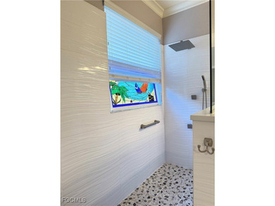 THIS LOVELY HOME IS A MUST SEE TO BELIEVE! This Lovely Home has on Gateway Golf and Country Club in Florida - for sale on GolfHomes.com, golf home, golf lot