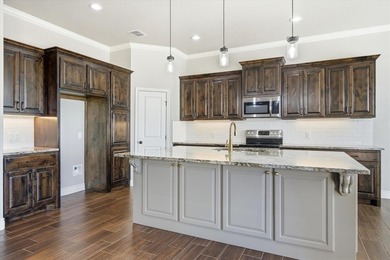 Custom Home in an excellent location on the Granbury Golf Course on Granbury Country Club in Texas - for sale on GolfHomes.com, golf home, golf lot