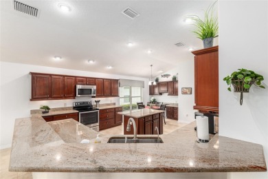 WELCOME TO THIS BEAUTIFUL DESIGNER HOLLY MODEL HOME IN THE on Pennbrooke Fairways in Florida - for sale on GolfHomes.com, golf home, golf lot