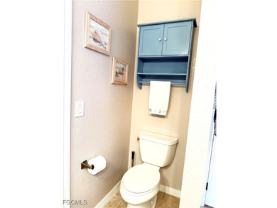 THIS LOVELY HOME IS A MUST SEE TO BELIEVE! This Lovely Home has on Gateway Golf and Country Club in Florida - for sale on GolfHomes.com, golf home, golf lot