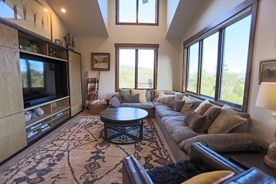 Tucked into the aspens and pines at the base of the Gore Range on Raven Golf Club At Three Peaks in Colorado - for sale on GolfHomes.com, golf home, golf lot