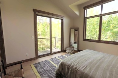 Tucked into the aspens and pines at the base of the Gore Range on Raven Golf Club At Three Peaks in Colorado - for sale on GolfHomes.com, golf home, golf lot
