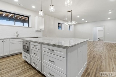 Beautiful & spacious custom home located in the desirable Teton on Teton Reserve in ID - for sale on GolfHomes.com, golf home, golf lot