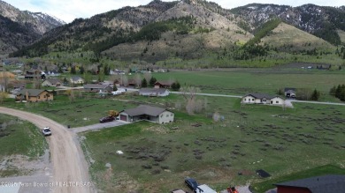 Level building lot located on the southern end of Star Valley on Star Valley RV Golf Course in Wyoming - for sale on GolfHomes.com, golf home, golf lot
