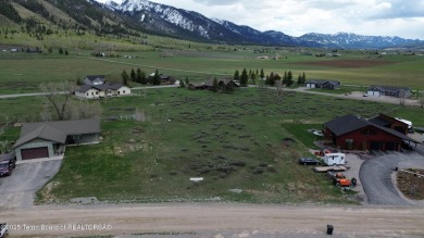 Level building lot located on the southern end of Star Valley on Star Valley RV Golf Course in Wyoming - for sale on GolfHomes.com, golf home, golf lot