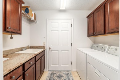 WELCOME TO THIS BEAUTIFUL DESIGNER HOLLY MODEL HOME IN THE on Pennbrooke Fairways in Florida - for sale on GolfHomes.com, golf home, golf lot