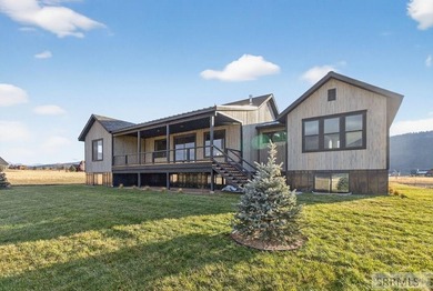 Beautiful & spacious custom home located in the desirable Teton on Teton Reserve in ID - for sale on GolfHomes.com, golf home, golf lot