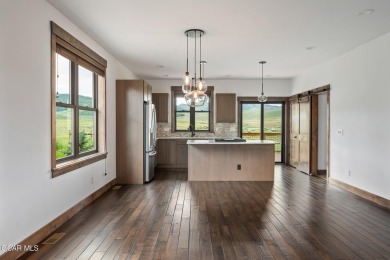 Nestled in the Grand Elk golf community this 3BD 3BA mountain on Grand Elk Ranch and Club in Colorado - for sale on GolfHomes.com, golf home, golf lot