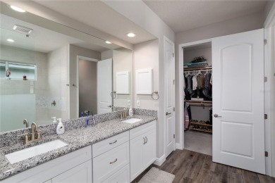 Elegant, beautifully landscaped Lee Wetherington 2-Bedroom on River Wilderness Golf and Country Club in Florida - for sale on GolfHomes.com, golf home, golf lot