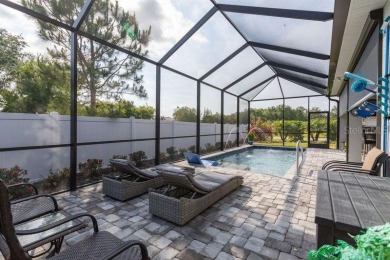 Elegant, beautifully landscaped Lee Wetherington 2-Bedroom on River Wilderness Golf and Country Club in Florida - for sale on GolfHomes.com, golf home, golf lot