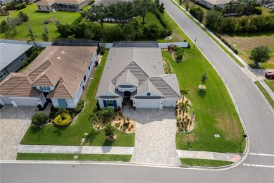 Elegant, beautifully landscaped Lee Wetherington 2-Bedroom on River Wilderness Golf and Country Club in Florida - for sale on GolfHomes.com, golf home, golf lot