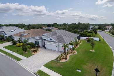 Elegant, beautifully landscaped Lee Wetherington 2-Bedroom on River Wilderness Golf and Country Club in Florida - for sale on GolfHomes.com, golf home, golf lot