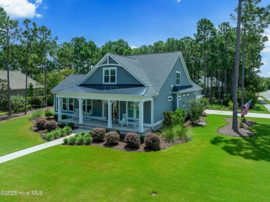 This nearly new residence is situated on a corner lot within the on Members Club At St. James Plantation in North Carolina - for sale on GolfHomes.com, golf home, golf lot