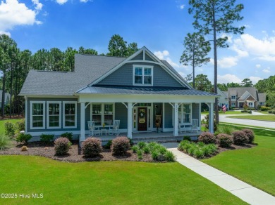 This nearly new residence is situated on a corner lot within the on Members Club At St. James Plantation in North Carolina - for sale on GolfHomes.com, golf home, golf lot